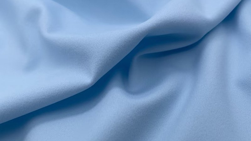 A close-up of different high-performance fabrics for fishing shirts